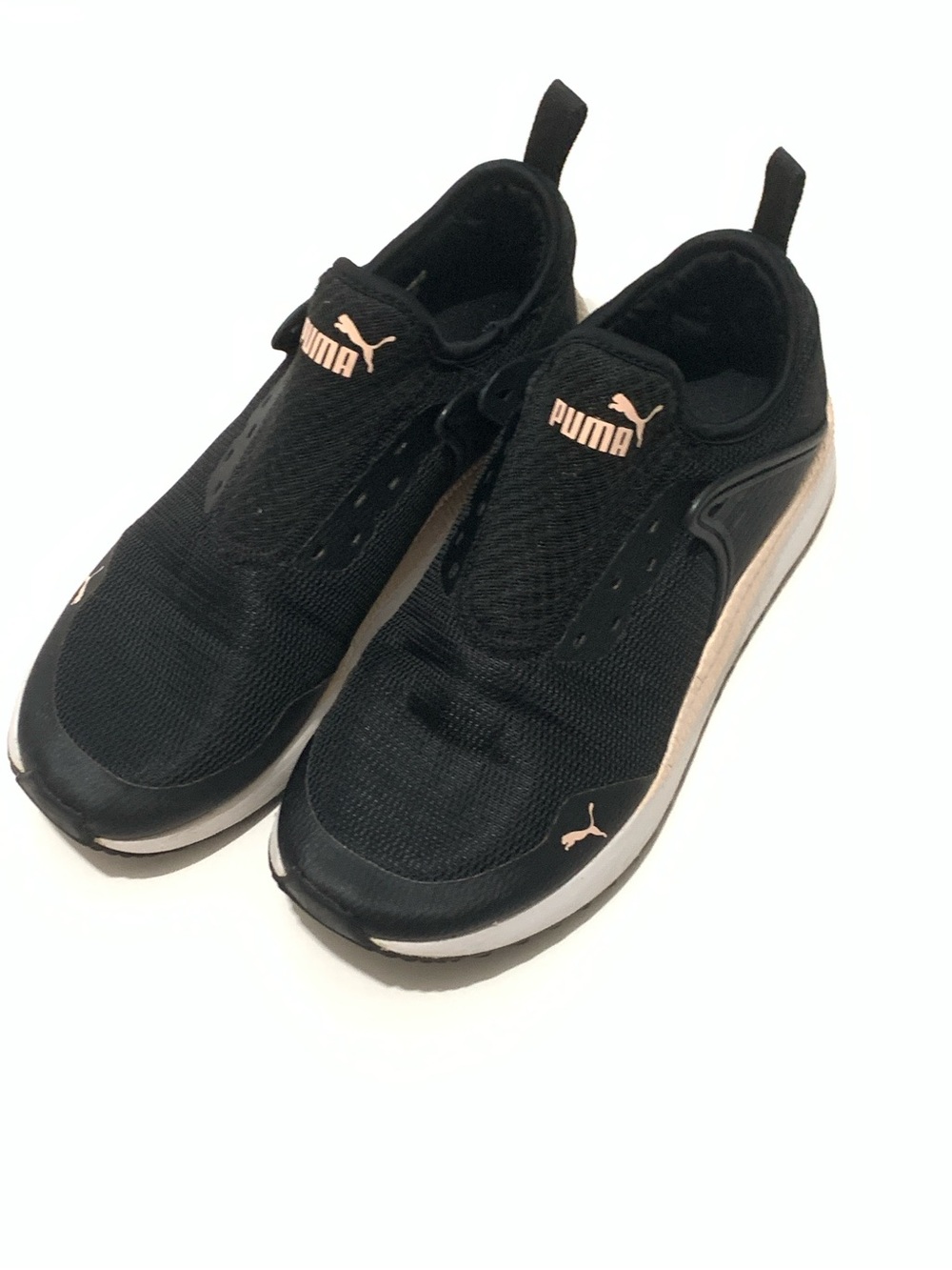 Puma Womenโs Black Slip-On Athletic Sneakers